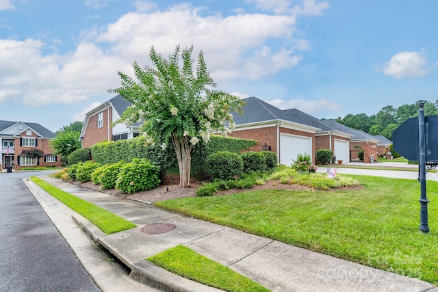 971 Blakeley Walk, Rock Hill, SC 29732 - view of front of house with brick siding, a garage, a front lawn, and driveway