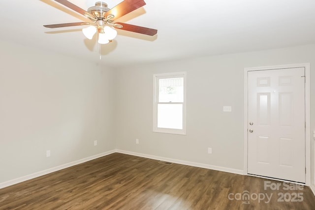 8079 Optimist Club Rd, Denver, NC 28037 - unfurnished room featuring dark wood-type flooring and a ceiling fan