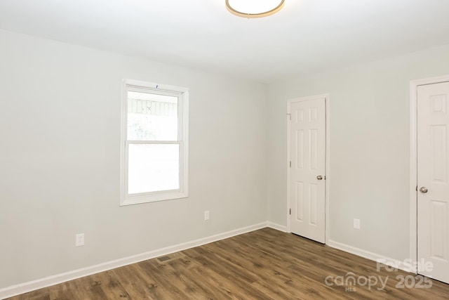 8079 Optimist Club Rd, Denver, NC 28037 - empty room featuring baseboards and wood finished floors