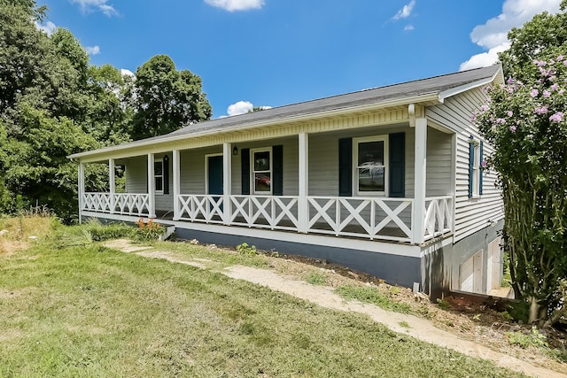 8079 Optimist Club Rd, Denver, NC 28037 - view of home's exterior featuring a porch and a lawn