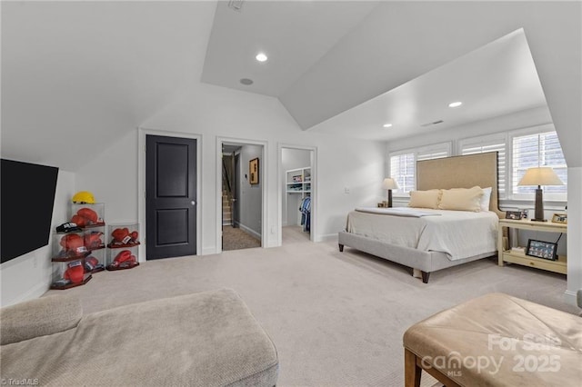 2990 Reynolds Sq, Winston Salem, NC 27106 - carpeted bedroom featuring vaulted ceiling, a walk in closet, and recessed lighting
