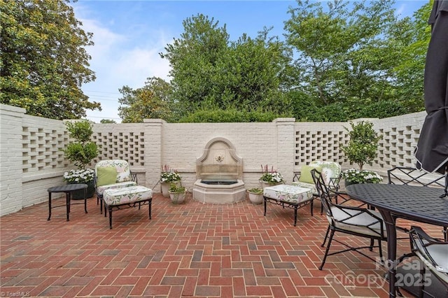 2990 Reynolds Sq, Winston Salem, NC 27106 - fenced backyard with a patio