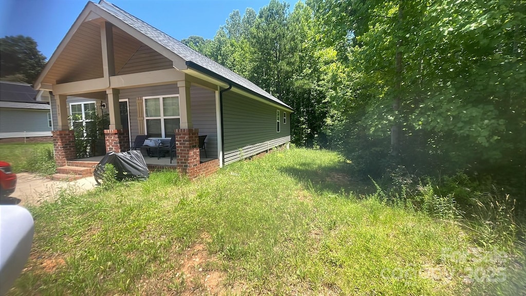 319 E Torbush Dr, Salisbury, NC 28144 - view of side of property with a porch