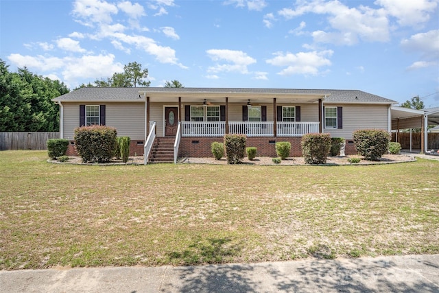 108 W Welsh St, Kershaw, SC 29067 - ranch-style house featuring a porch, a ceiling fan, and a carport