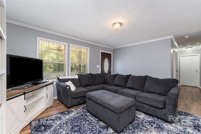 108 W Welsh St, Kershaw, SC 29067 - living area with light wood-style flooring, ornamental molding, and a textured ceiling