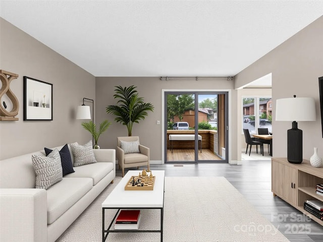 1745 Haywood Manor Rd Unit A, Hendersonville, NC 28791 - living area with wood finished floors and baseboards