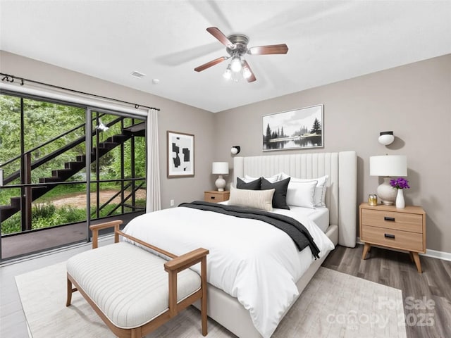 1745 Haywood Manor Rd Unit A, Hendersonville, NC 28791 - bedroom featuring wood finished floors, ceiling fan, and access to outside