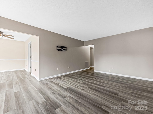 1745 Haywood Manor Rd Unit A, Hendersonville, NC 28791 - empty room featuring wood finished floors and ceiling fan