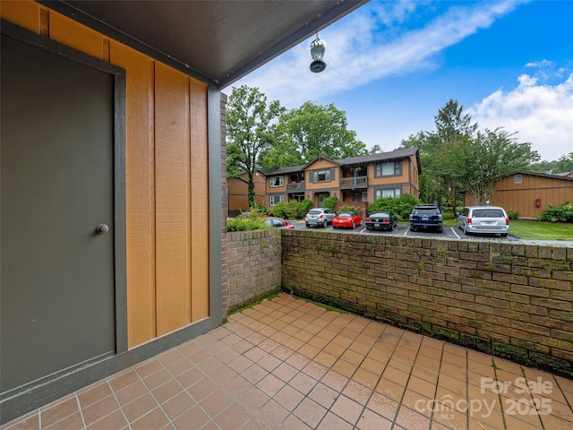 1745 Haywood Manor Rd Unit A, Hendersonville, NC 28791 - view of patio / terrace with a residential view