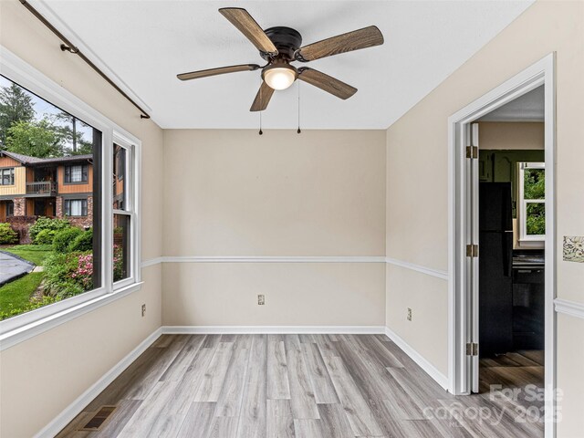 1745 Haywood Manor Rd Unit A, Hendersonville, NC 28791 - spare room with wood finished floors and ceiling fan