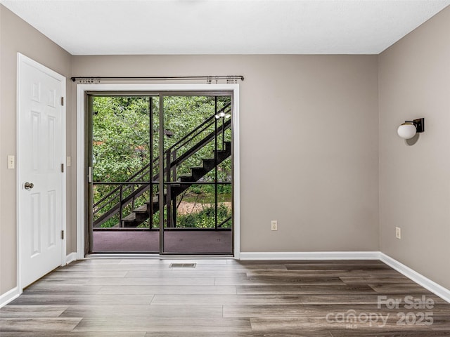 1745 Haywood Manor Rd Unit A, Hendersonville, NC 28791 - spare room with wood finished floors and baseboards