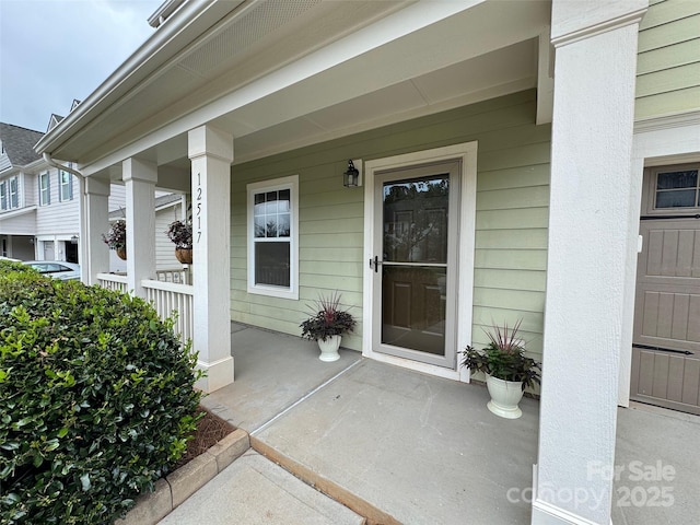 12517 Pine Terrace Ct, Charlotte, NC 28273 - view of exterior entry with covered porch