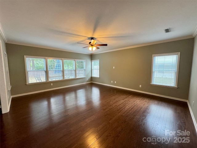12517 Pine Terrace Ct, Charlotte, NC 28273 - spare room with dark wood-type flooring, ceiling fan, and ornamental molding