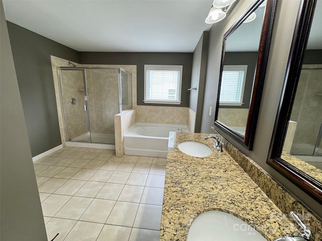 12517 Pine Terrace Ct, Charlotte, NC 28273 - bathroom with tile patterned flooring, a stall shower, a bath, and double vanity