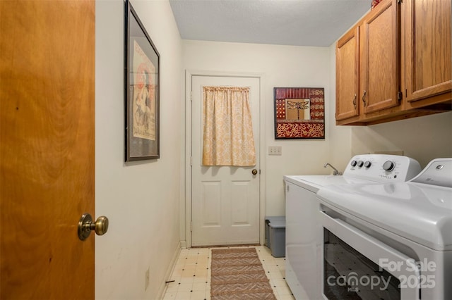 144 Beechwood Dr, Columbus, NC 28722 - laundry area with independent washer and dryer, light floors, and cabinet space