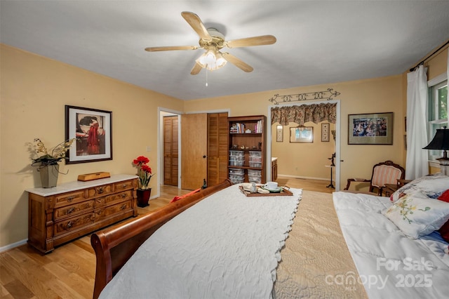 144 Beechwood Dr, Columbus, NC 28722 - bedroom featuring light wood-style flooring and ceiling fan