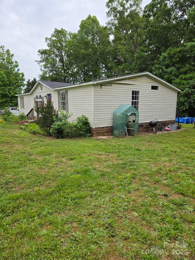 245 Waycross Dr, Rockwell, NC 28138 - back of property with a yard