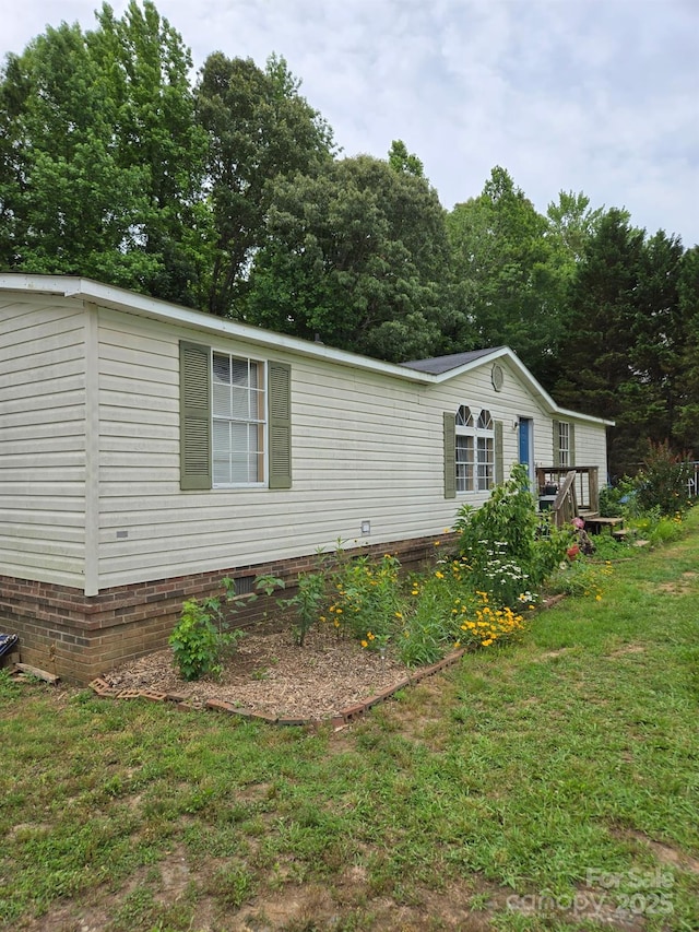245 Waycross Dr, Rockwell, NC 28138 - view of property exterior with a lawn, crawl space, and a deck