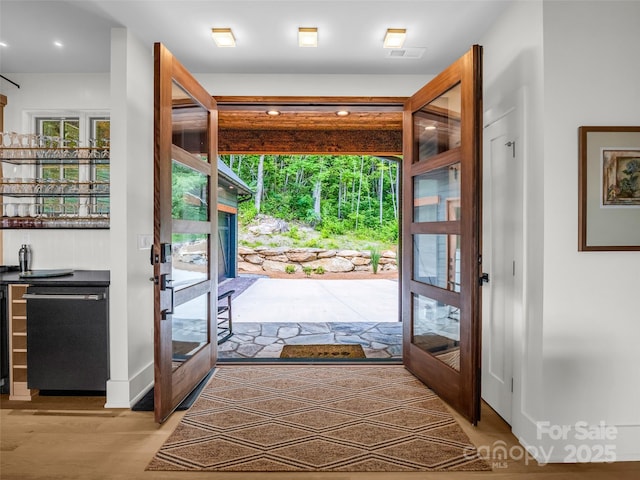 627 Cherry Hl Unit 201, Mill Spring, NC 28756 - foyer entrance with light wood-type flooring, french doors, recessed lighting, and bar