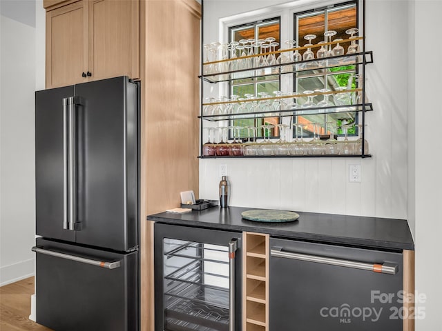627 Cherry Hl Unit 201, Mill Spring, NC 28756 - indoor dry bar with high end fridge, beverage cooler, wood finished floors, and dishwashing machine