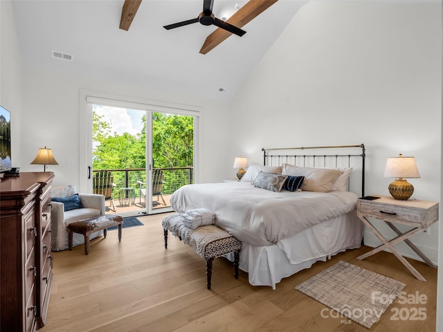 627 Cherry Hl Unit 201, Mill Spring, NC 28756 - bedroom with access to outside, high vaulted ceiling, beam ceiling, light wood-type flooring, and ceiling fan