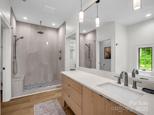 627 Cherry Hl Unit 201, Mill Spring, NC 28756 - bathroom featuring a walk in shower, wood finished floors, vanity, and recessed lighting