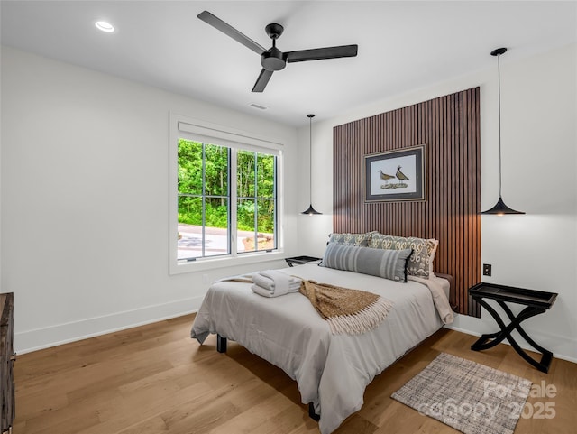 627 Cherry Hl Unit 201, Mill Spring, NC 28756 - bedroom featuring wood finished floors, a ceiling fan, and recessed lighting