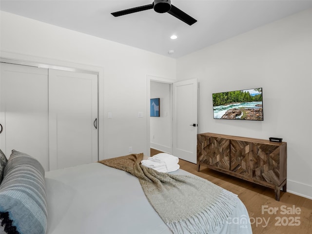 627 Cherry Hl Unit 201, Mill Spring, NC 28756 - bedroom featuring wood finished floors, a closet, ceiling fan, and recessed lighting