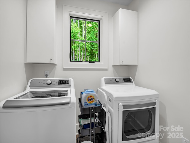 627 Cherry Hl Unit 201, Mill Spring, NC 28756 - laundry room with cabinet space and independent washer and dryer