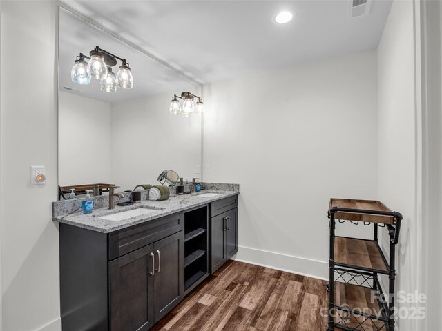 627 Cherry Hl Unit 201, Mill Spring, NC 28756 - bathroom featuring wood finished floors and double vanity