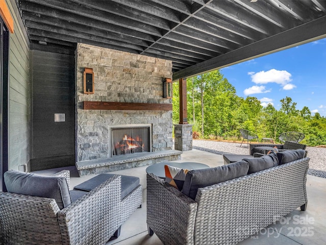627 Cherry Hl Unit 201, Mill Spring, NC 28756 - view of patio with an outdoor living space with a fireplace