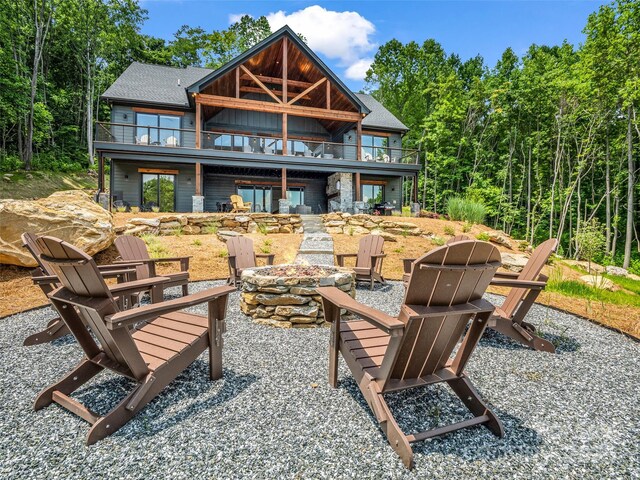 627 Cherry Hl Unit 201, Mill Spring, NC 28756 - rear view of property featuring an outdoor fire pit and a deck