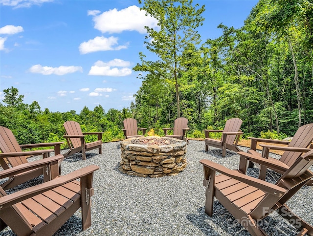 627 Cherry Hl Unit 201, Mill Spring, NC 28756 - view of patio / terrace featuring an outdoor fire pit