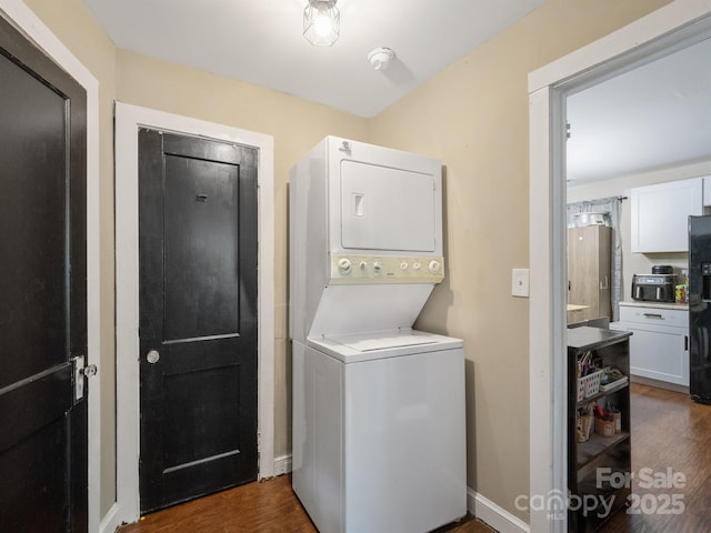 206 Friedheim Rd, Rock Hill, SC 29730 - laundry area featuring stacked washing machine and dryer and dark wood finished floors