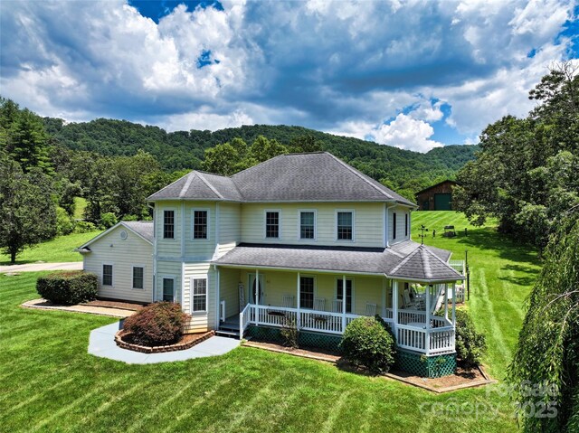 80 Meadow Creek Drive 40 & 61, Weaverville, NC 28787 - view of front facade featuring a porch, a front yard, and a forest view