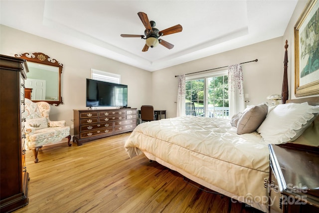 80 Meadow Creek Drive 40 & 61, Weaverville, NC 28787 - bedroom with a raised ceiling, access to outside, wood finished floors, and ceiling fan