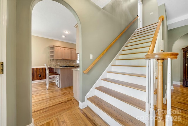 80 Meadow Creek Drive 40 & 61, Weaverville, NC 28787 - stairway with arched walkways, wood finished floors, crown molding, and recessed lighting