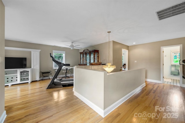 80 Meadow Creek Drive 40 & 61, Weaverville, NC 28787 - living area featuring light wood finished floors and a ceiling fan