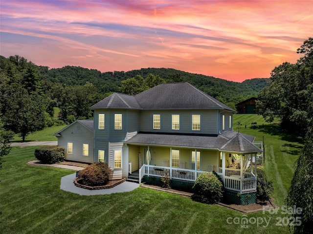 80 Meadow Creek Drive 40 & 61, Weaverville, NC 28787 - view of front of house with covered porch, a yard, and a view of trees