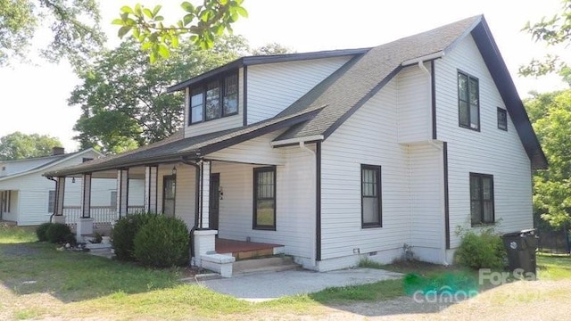 404 Main St N, Clover, SC 29710 - view of front of house featuring a porch and a shingled roof