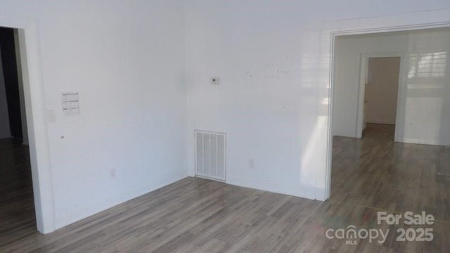 404 Main St N, Clover, SC 29710 - spare room featuring wood finished floors