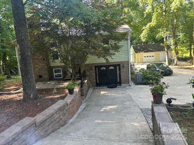 3211 Winding Trl, Matthews, NC 28105 - obstructed view of property with brick siding