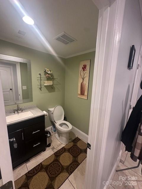 3211 Winding Trl, Matthews, NC 28105 - bathroom with vanity, tile patterned flooring, and crown molding