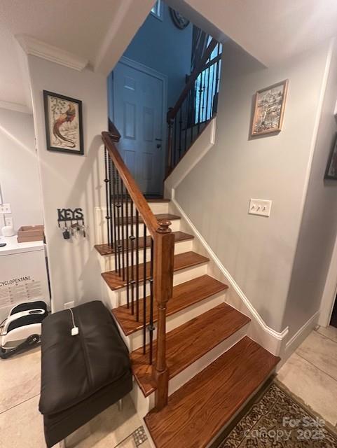 3211 Winding Trl, Matthews, NC 28105 - staircase with tile patterned flooring and ornamental molding