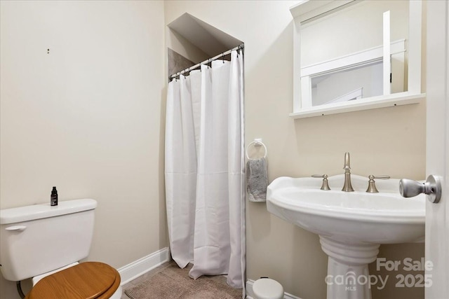 275 Haynes Dr, Salisbury, NC 28146 - bathroom with toilet and a shower with curtain