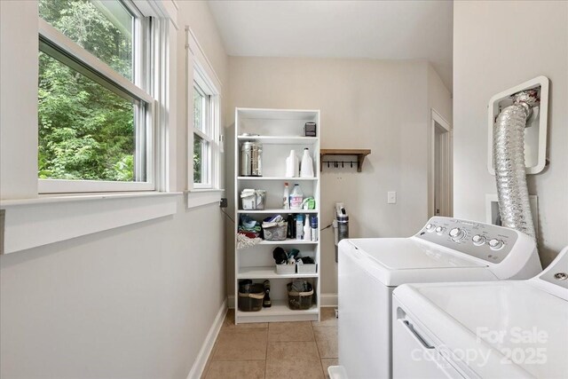 275 Haynes Dr, Salisbury, NC 28146 - laundry area featuring washer and clothes dryer and light tile patterned flooring