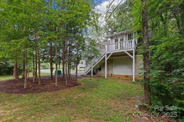 275 Haynes Dr, Salisbury, NC 28146 - view of grassy yard with stairway and a wooden deck
