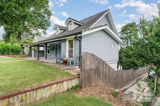 135 Corban Ave SE, Concord, NC 28025 - view of side of home featuring a patio