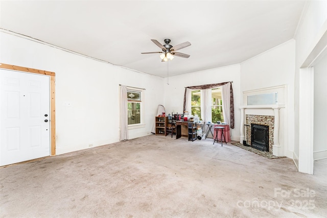 135 Corban Ave SE, Concord, NC 28025 - carpeted living area with ceiling fan and a tile fireplace