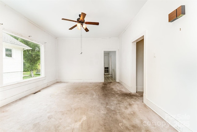 135 Corban Ave SE, Concord, NC 28025 - unfurnished room with ceiling fan and ornamental molding